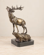 Stag on a Rock Bronze Sculpture — 37.8 cm Tall — second view against a warm ivory background