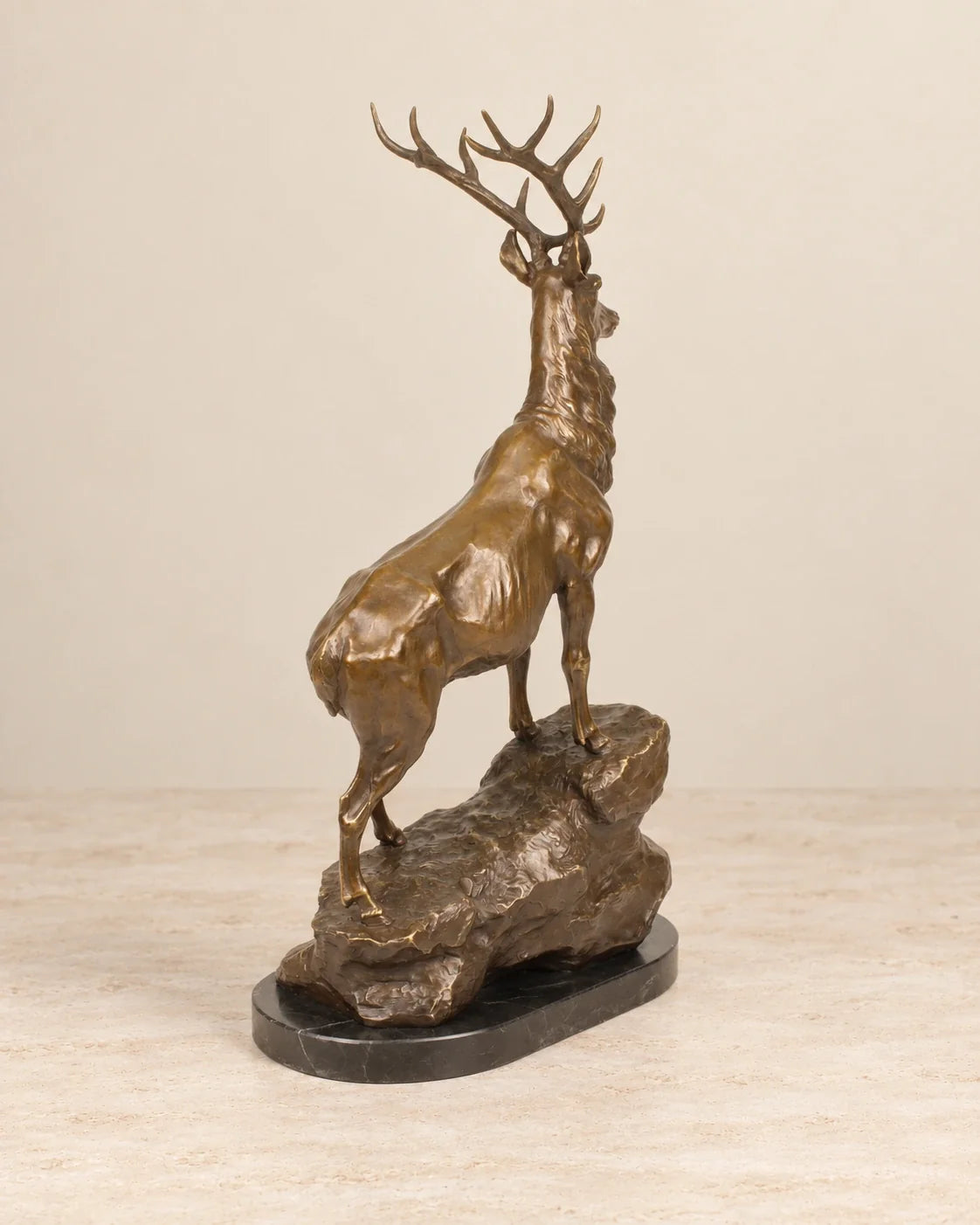Stag on a Rock Bronze Sculpture — 67.8 cm Tall — second view against a warm ivory background