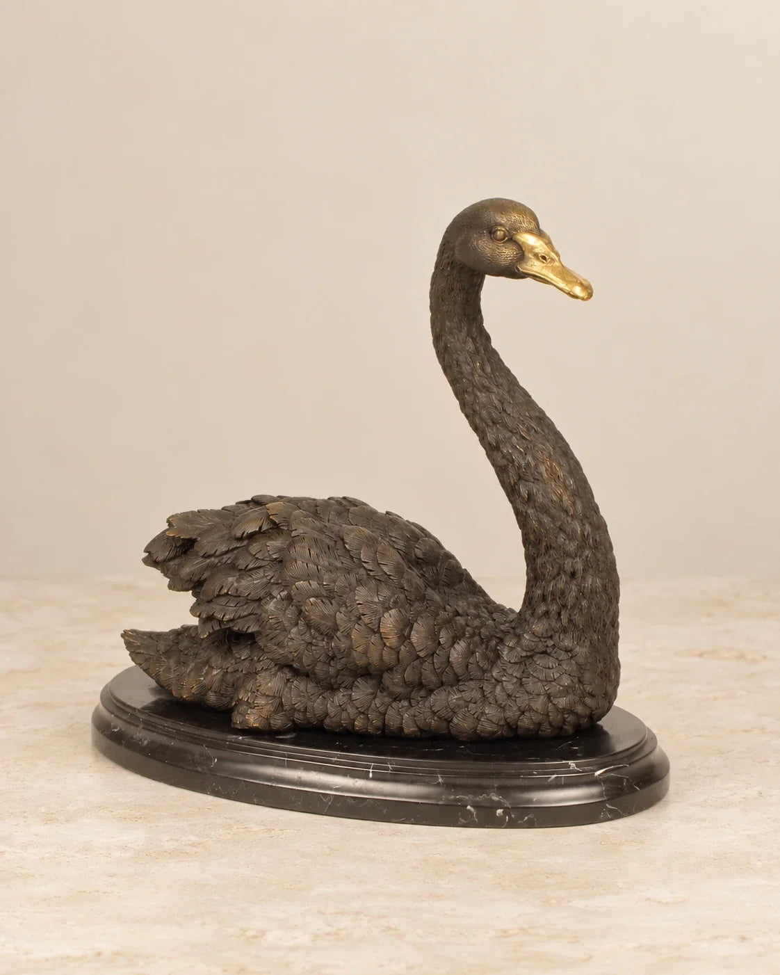 Swan Bronze Sculpture — primary view against a warm ivory background
