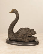 Swan Bronze Sculpture — second view against a warm ivory background