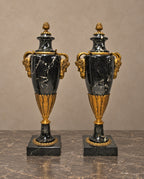 Pair of Black Marble Urns with Gilt-Bronze Masks — main view