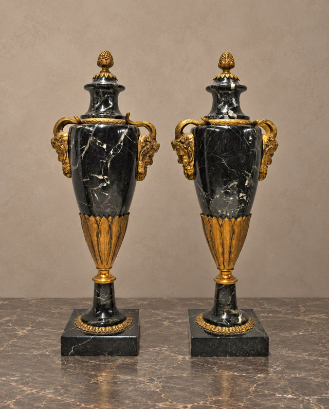Pair of Black Marble Urns with Gilt-Bronze Masks