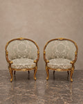 Pair of Louis XV-Style Gilt-Accented Damask Armchairs — main view