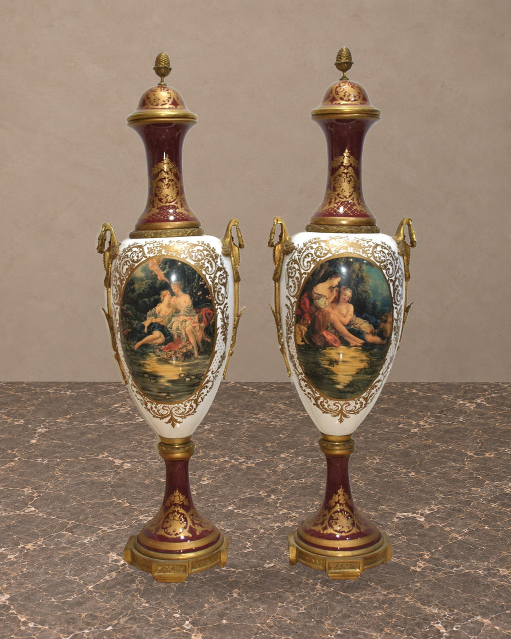 Pair of Monumental Burgundy Porcelain Vases with Pastoral Scenes — main view