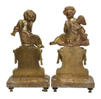 Pair of Gilt-Bronze Cherubs on Onyx Pedestals — alternative view or condition detail