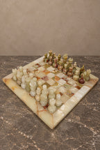 Carved Onyx Chess Set with Variegated Stone Board — main view