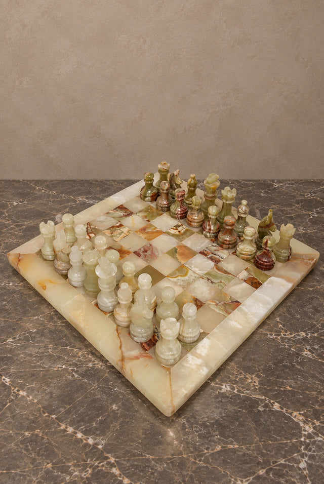 Carved Onyx Chess Set with Variegated Stone Board