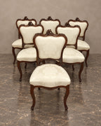 Set of Six Louis XV-Style Carved Dining Chairs — main view