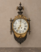 Urn-Crest Wall Clock in Dark Wood and Gilt Bronze — main view