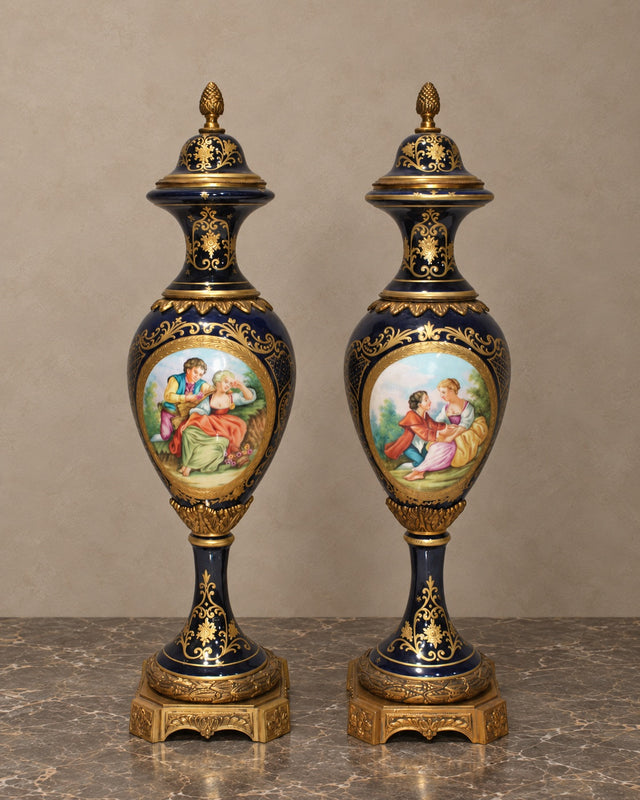 Pair of Cobalt Porcelain Lidded Vases with Romantic Scenes
