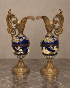 Pair of Cobalt Ceramic Cherub Ewers with Gilt-Bronze Mounts — main view
