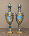 Pair of Monumental Blue Porcelain Vases with Mythological Scenes — main view