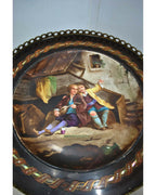 Original detail of the painted porcelain top, preserving the scene and visible restoration lines