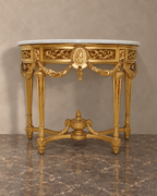 Louis XVI-style giltwood demi-lune console with original white marble top, floral garlands and central urn — main view
