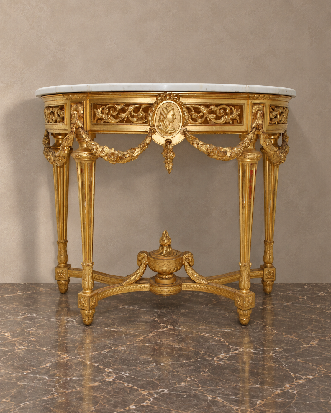 Louis XVI-style giltwood demi-lune console with original white marble top, floral garlands and central urn — main view