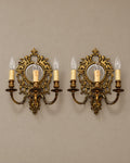 Pair of Louis XVI-Style Cherub Mirror Sconces — styled main view