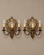 Pair of Louis XVI-Style Cherub Mirror Sconces — styled main view