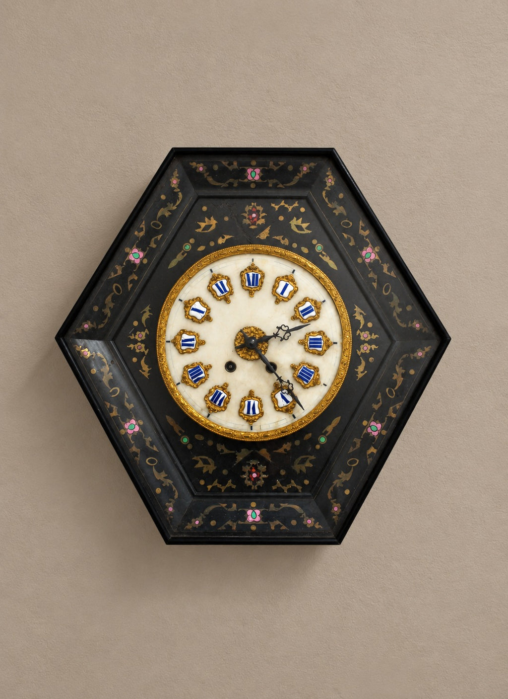 Hexagonal Ebonized Wall Clock with Floral Decoration — styled main view