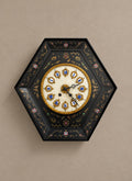 Hexagonal Ebonized Wall Clock with Floral Decoration — styled main view