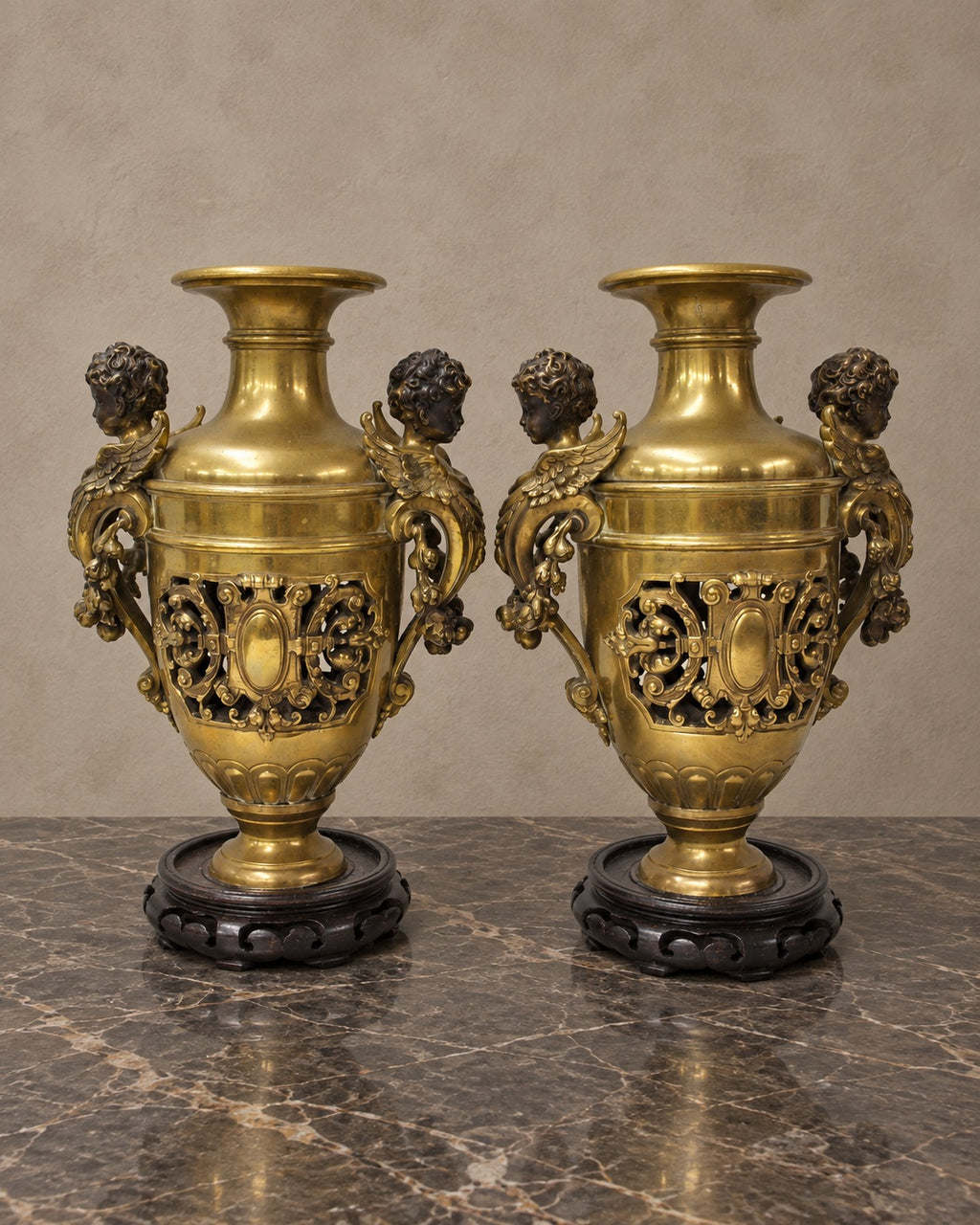 Pair of Bronze Amphora Vases with Cherub Handles — styled main view