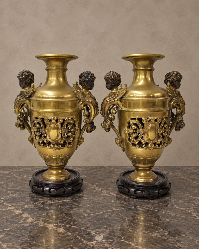 Pair of Bronze Amphora Vases with Cherub Handles