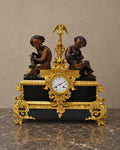 French Napoleon III Figural Bronze Mantel Clock — styled main view