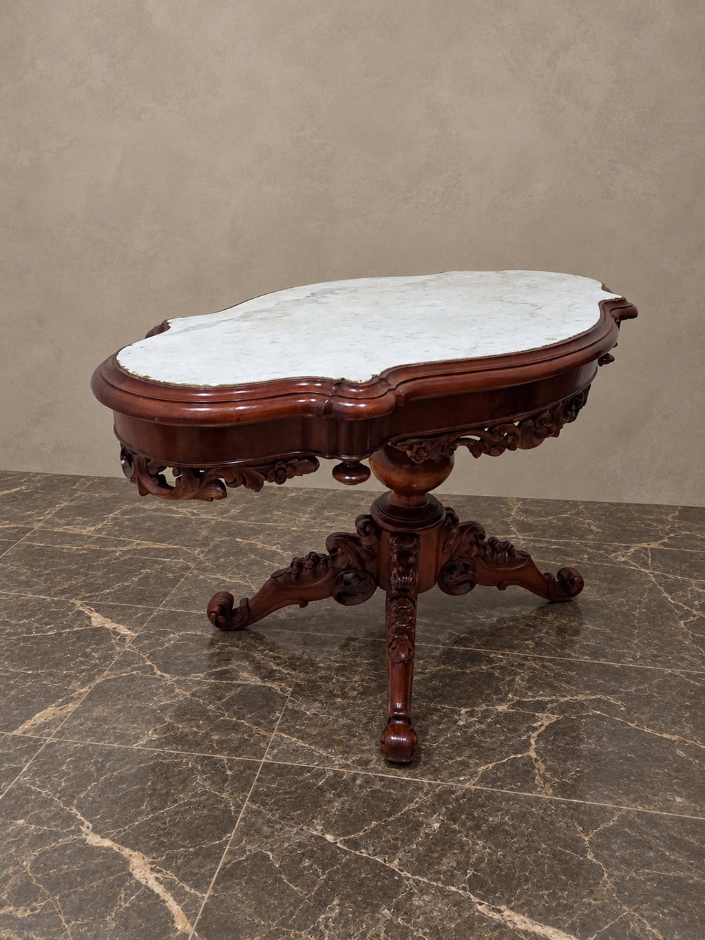 Isabelino-Style Carved Mahogany Marble-Top Table — styled main view