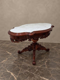 Isabelino-Style Carved Mahogany Marble-Top Table — styled main view