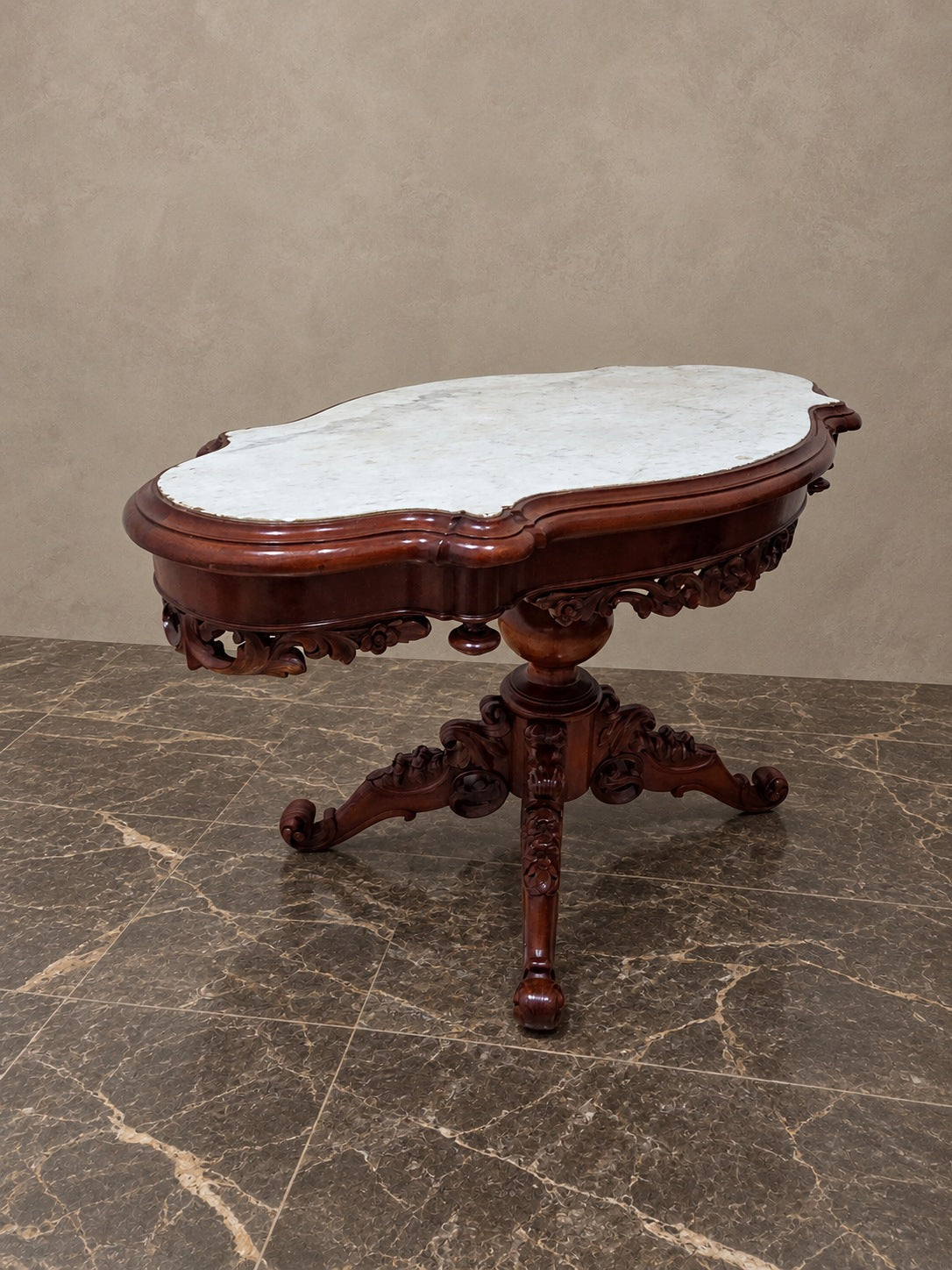 Isabelino-Style Carved Mahogany Marble-Top Table — styled main view