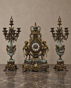 Figural Clock Garniture in Metal and Green Marble — styled main view
