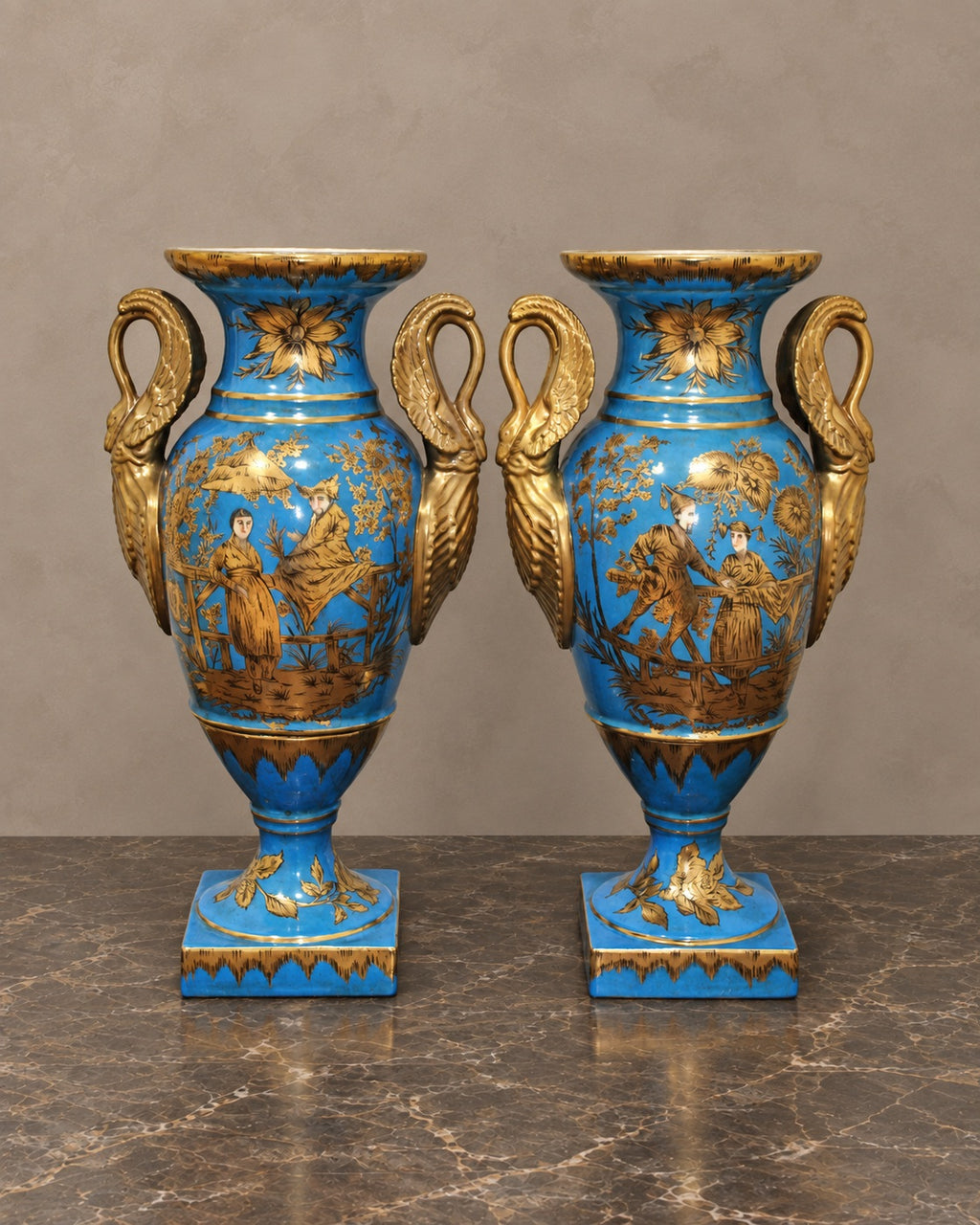 Pair of Turquoise Porcelain Swan-Handled Vases — complete piece in taupe and marble setting