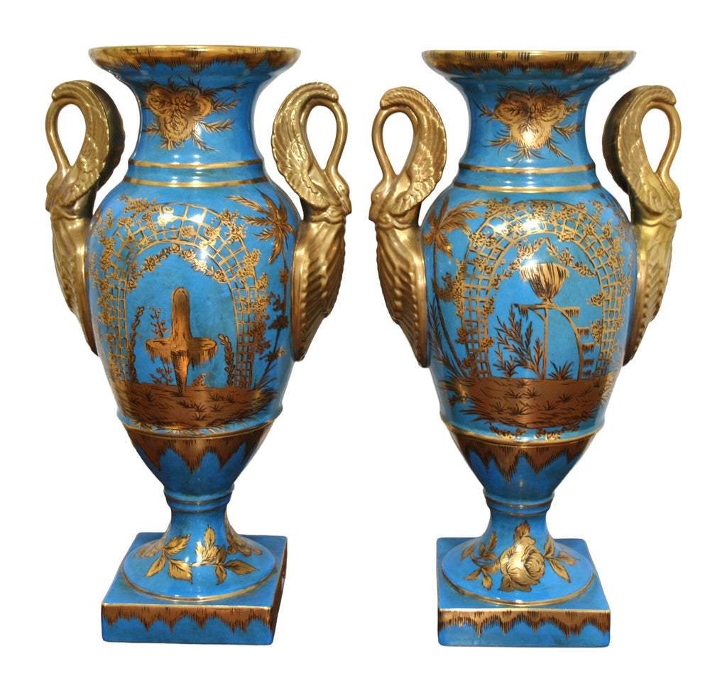 Pair of Turquoise Porcelain Swan-Handled Vases — documentary view on white