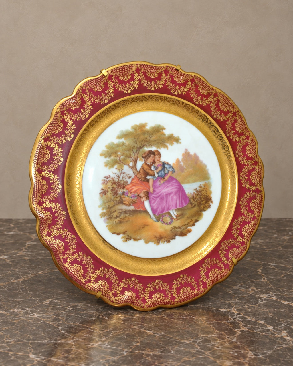 Limoges Porcelain Plate with Romantic Scene — complete piece in taupe and marble setting