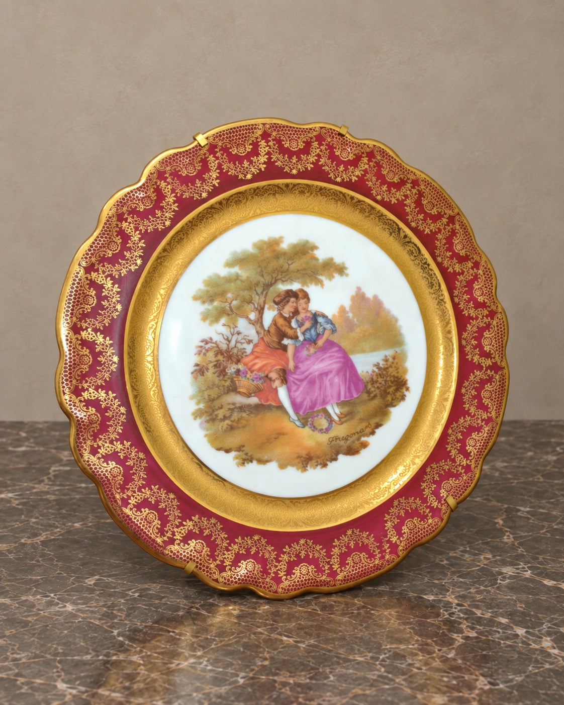 Limoges Porcelain Plate with Romantic Scene — complete piece in taupe and marble setting