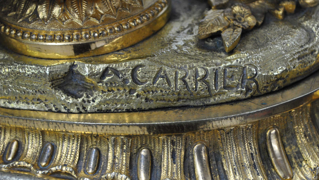 Original close-up of the A. Carrier signature and wear to the gilding