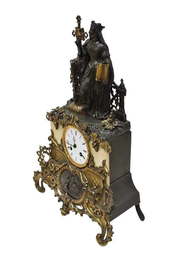Original oblique view of the mantel clock on white, preserving its metalwork and patina