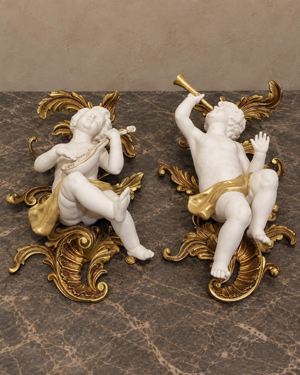 Pair of Biscuit Porcelain Musical Cherubs on Gilt-Bronze Supports — styled front view