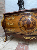 Original detail photograph of the rose marble chest's floral marquetry, drawer handles and bronze mounts.