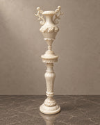 Illuminated Marble Urn on Matching Column — styled main photograph