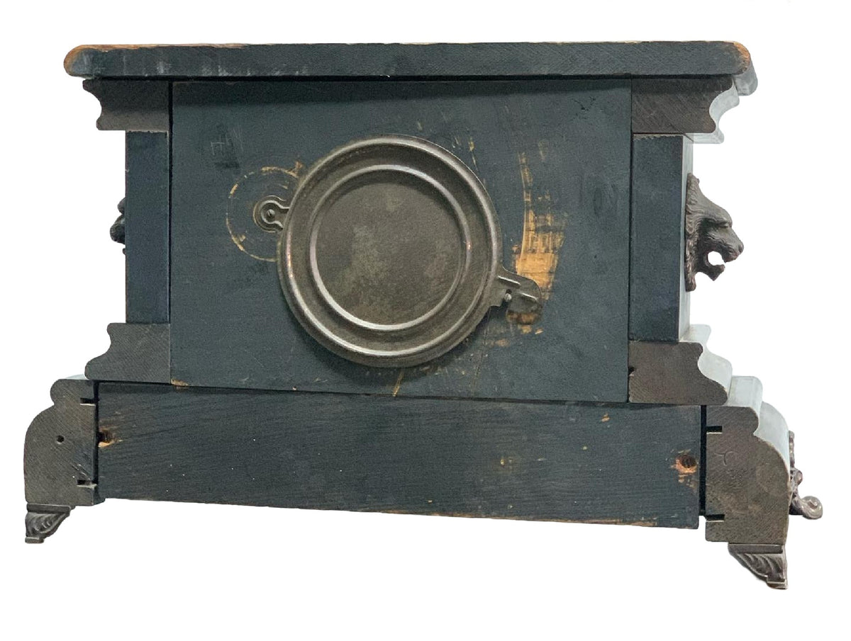 Rear condition view on white, showing worn black finish and exposed wood