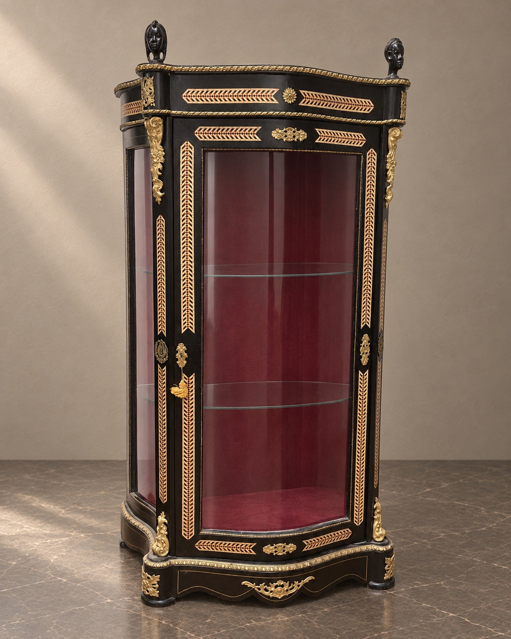 Napoleon III marquetry display cabinet with curved glass, bronze mounts and burgundy lining