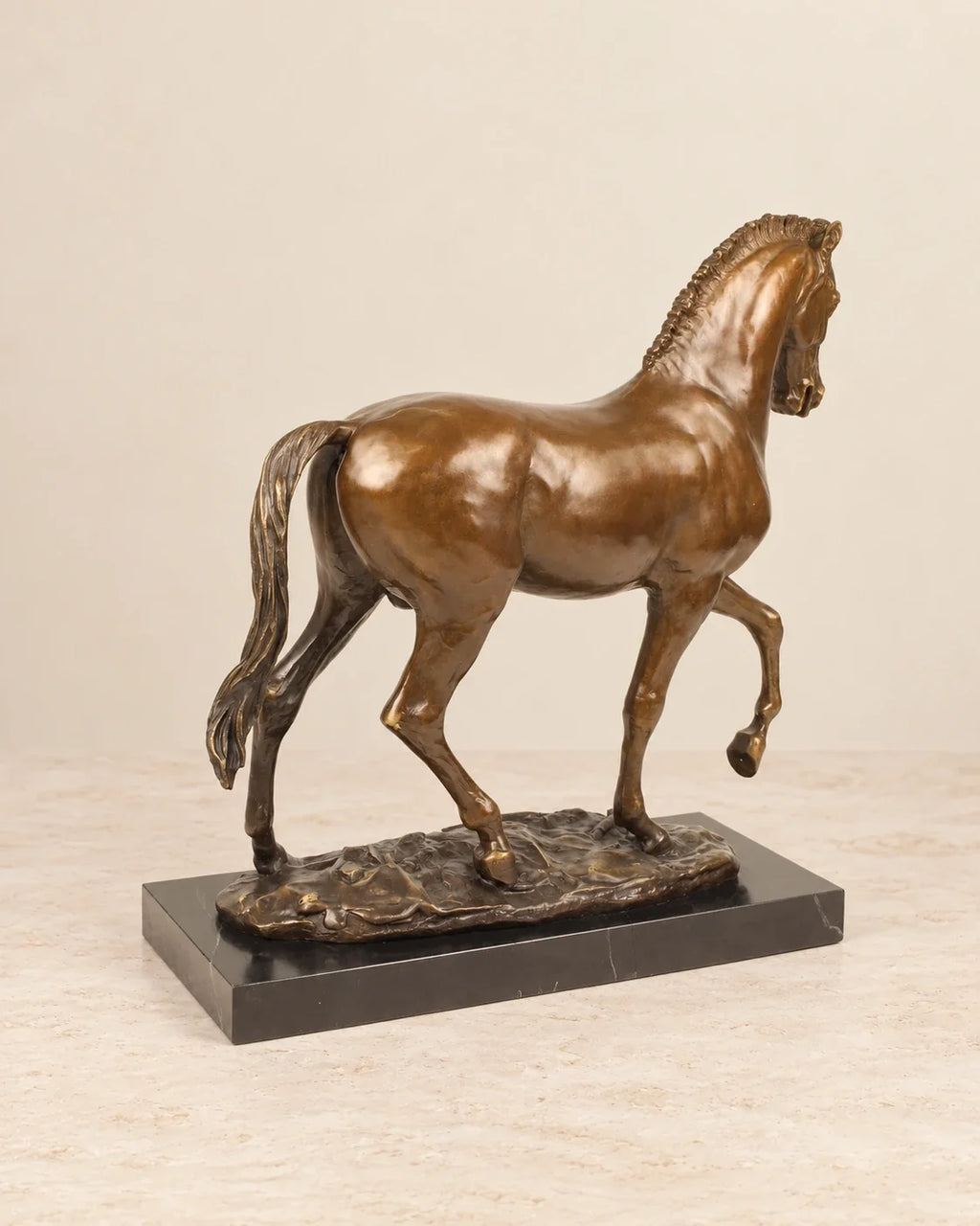 Trotting Horse Bronze Sculpture — second view against a warm ivory background