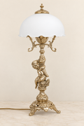 Cherub table lamp with white domed shade