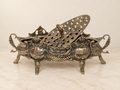 Ornate bronze flower bowl with pierced insert