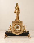 Crowned lady mantel clock with a dark plinth