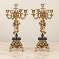 Pair of five-light candelabra with cherub supports