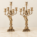 Pair of five-light candelabra with cherub figures
