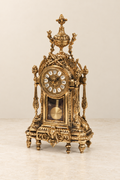 D. Luis mantel clock with visible pendulum