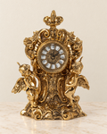 Mantel clock with two winged cherubs