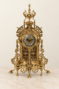 Architectural mantel clock with urn finial